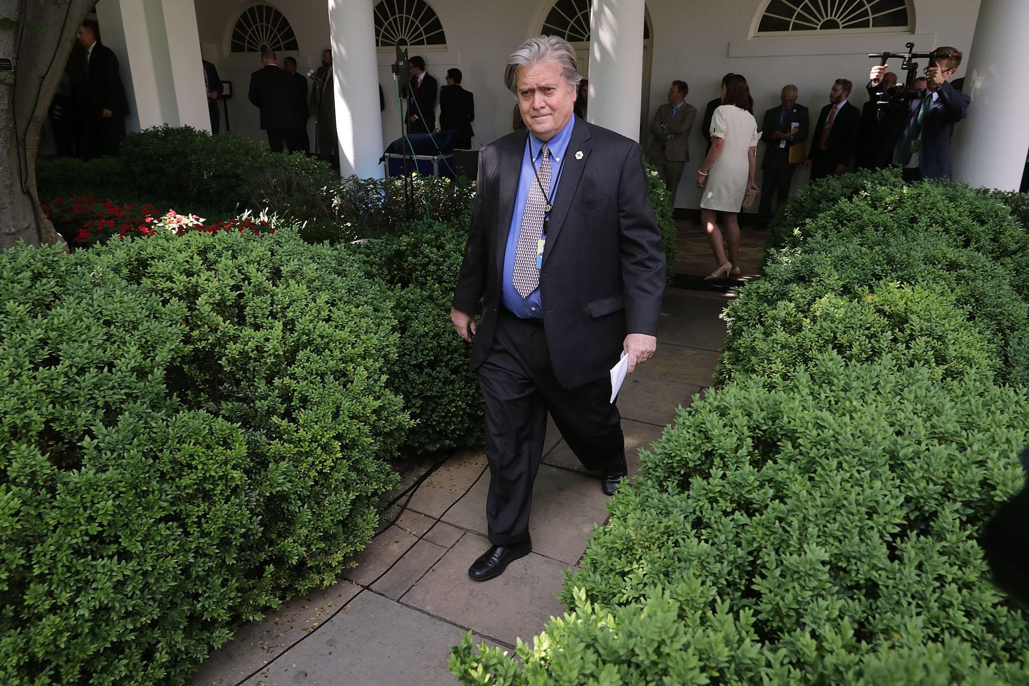 White House Chief Strategist Steve Bannon walks into the Rose Garden before President Donald Trump announces his decision to pull out of the Paris climate agreement