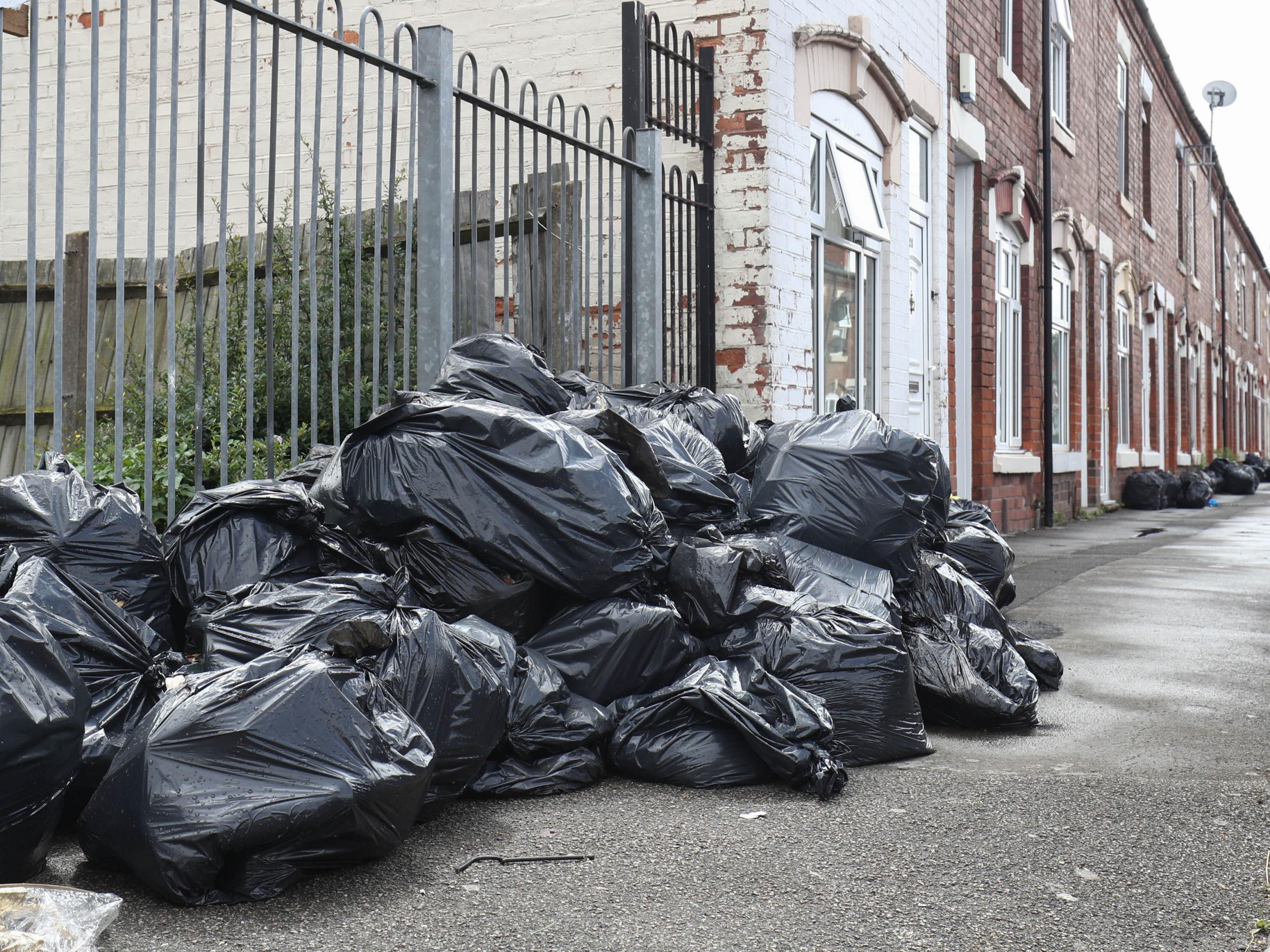 Rubbish bags piled high in Tarry Road, Birmingham, as bin workers are set to resume strike action after a union called the council's move to begin issuing redundancy notices a "provocative act"