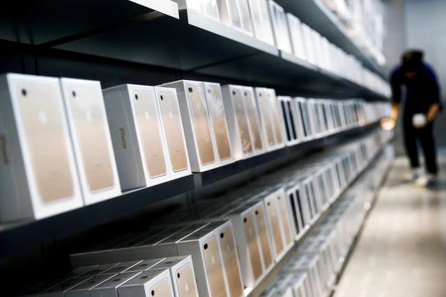 Apple's new iPhone 7 smartphones sit on a shelf at an Apple store in Beijing, China, September 16, 2016