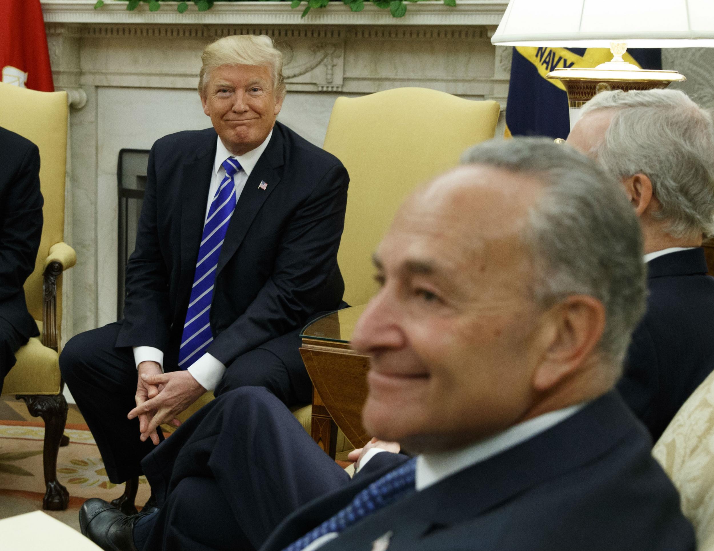 Senator Chuck Schumer beams during the Oval Office meeting where he and Nancy Pelosi struck a budget deal with President Trump