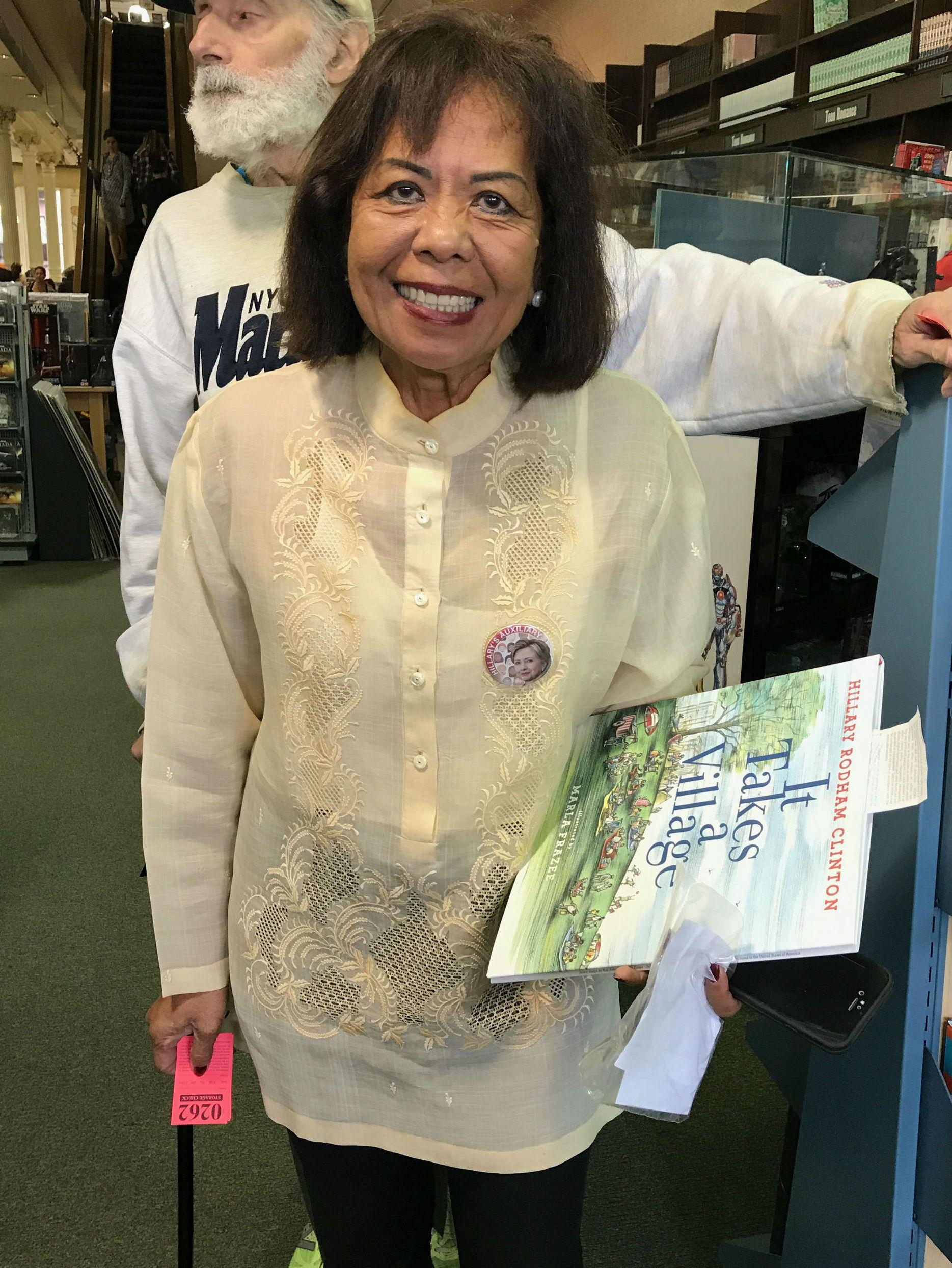 Pura Molina wears her barong tagalog to meet Ms Clinton