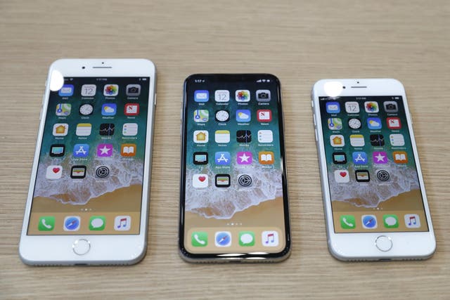 (L-R) iPhone 8 Plus, iPhone X and iPhone 8 models are displayed during an Apple launch event in Cupertino, California, U.S. September 12, 2017