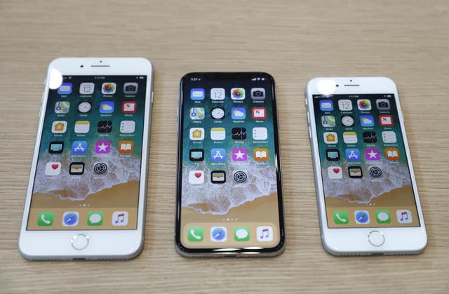 (L-R) iPhone 8 Plus, iPhone X and iPhone 8 models are displayed during an Apple launch event in Cupertino, California, U.S. September 12, 2017
