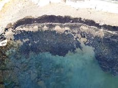 Oil spill turns Greek island bay black and deemed 'disaster'