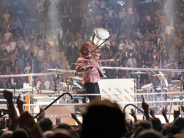 Will Butler bangs his drum inside Madison Square Garden's musical boxing ring