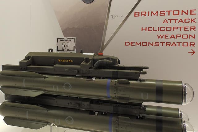 Weapons, vehicles and prototypes on display at the DSEI arms fair in London on 13 September