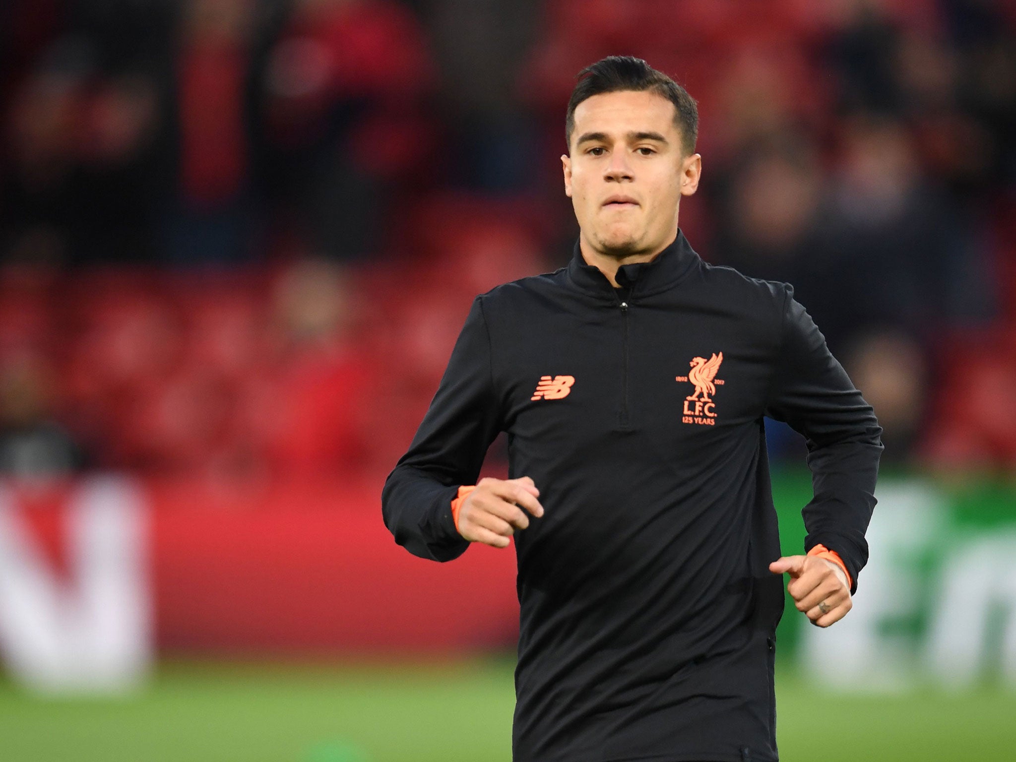 Coutinho warms up on his return to Anfield