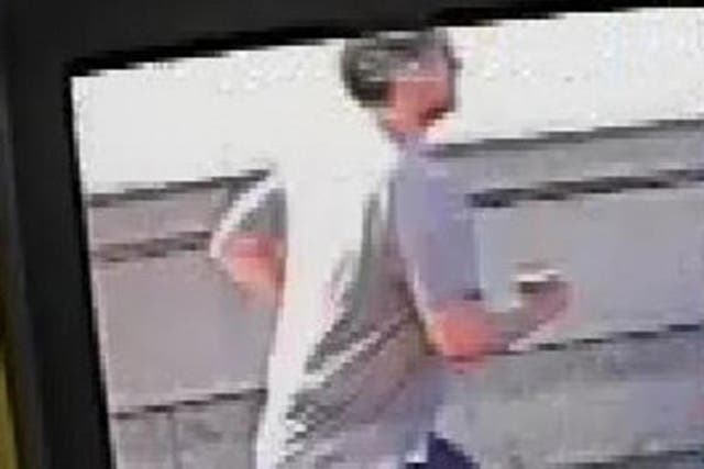 The 'Putney pusher' seen here in a CCTV still issued by the Metropolitan Police is suspected of pushing a woman in front of a London bus earlier this year