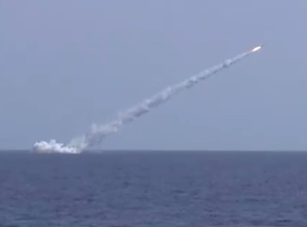 A Russian submarine fires a cruise missile toward Isis forces in Syria