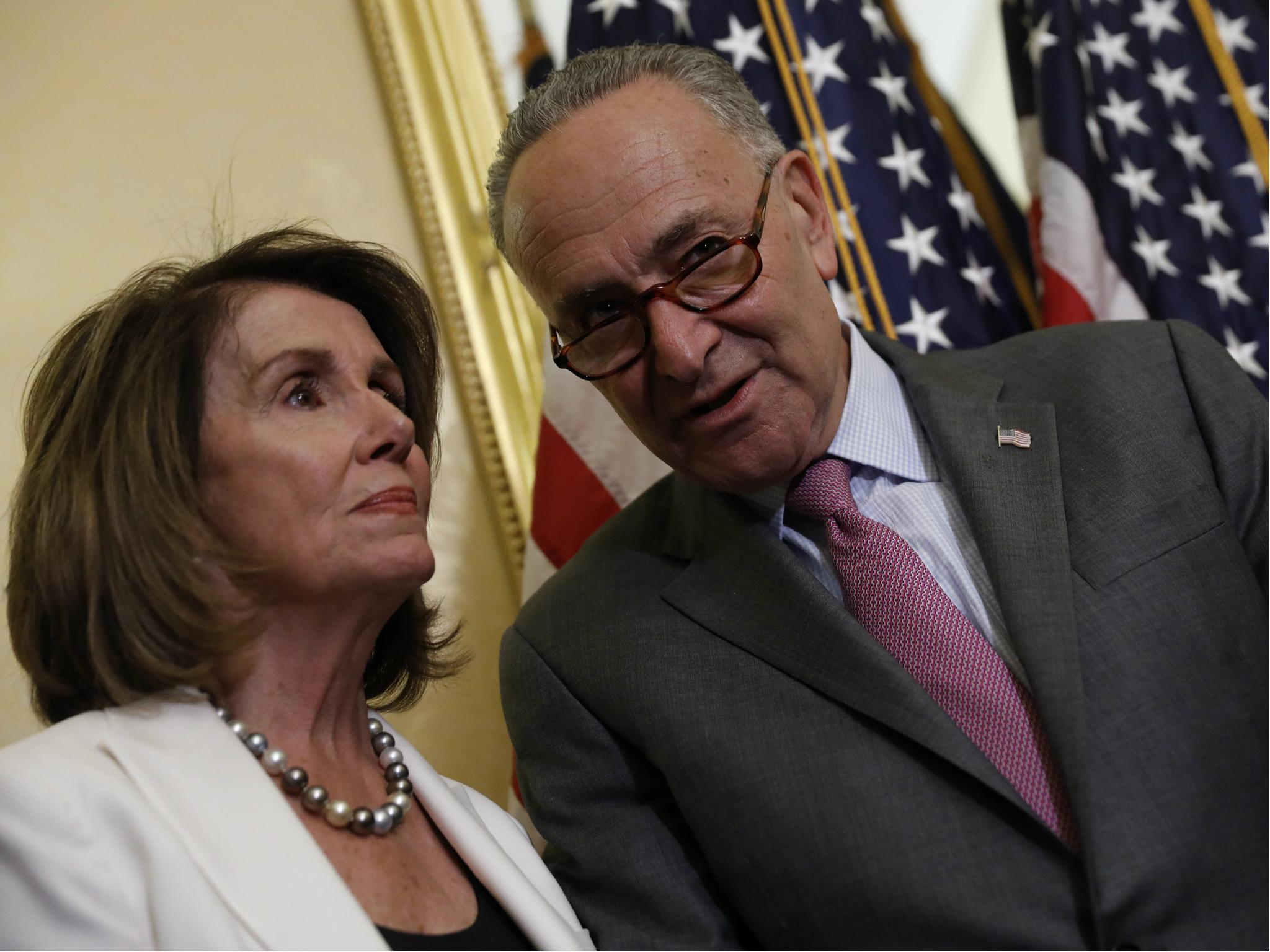 Senate Minority Leader Chuck Schumer speaks with House Minority Leader Nancy Pelosi had dinner with Donald Trump at the White House to discuss undocumented immigrants on 13 September 2017.