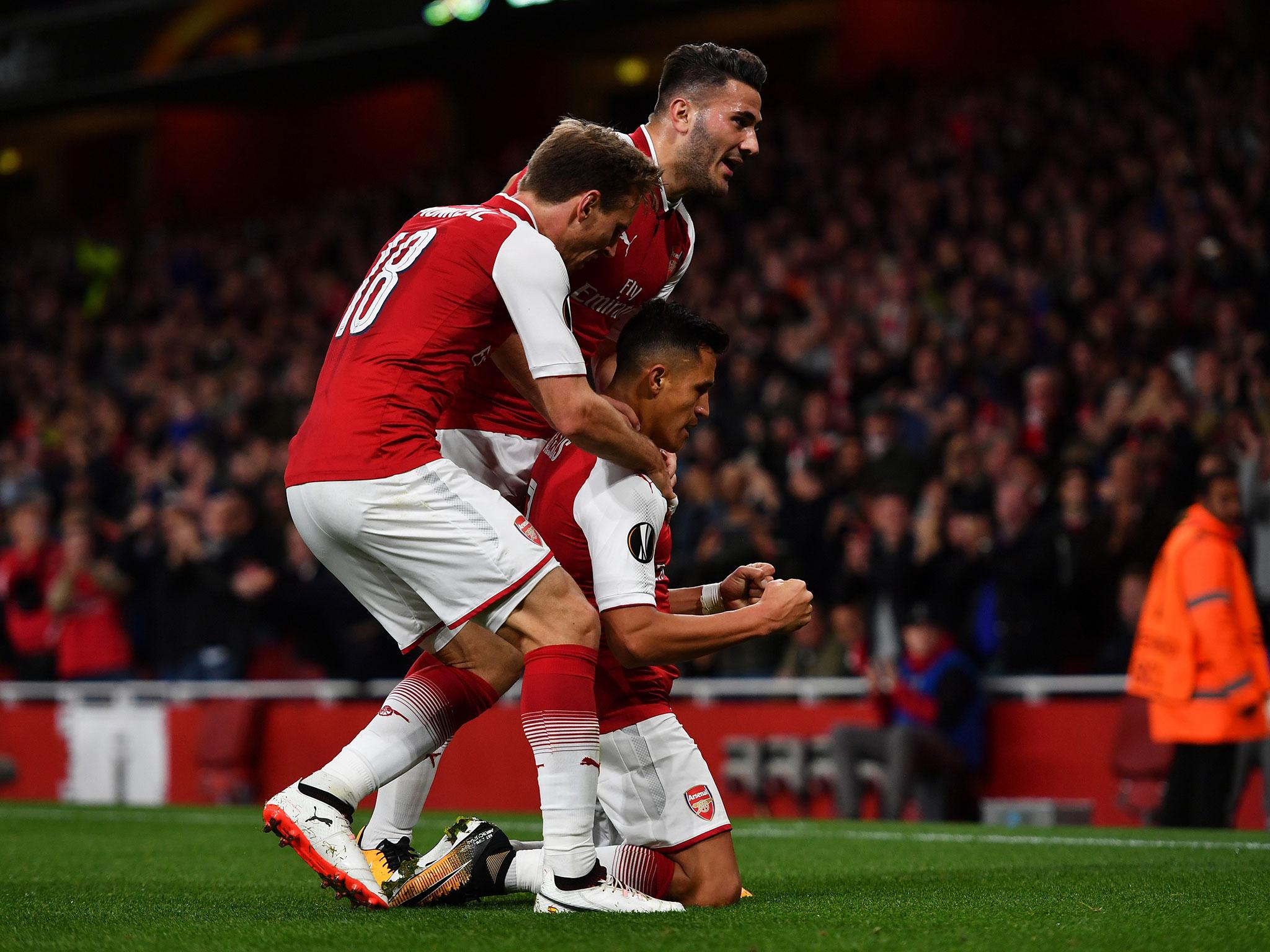 Alexis Sanchez celebrates putting Arsenal ahead in the second half