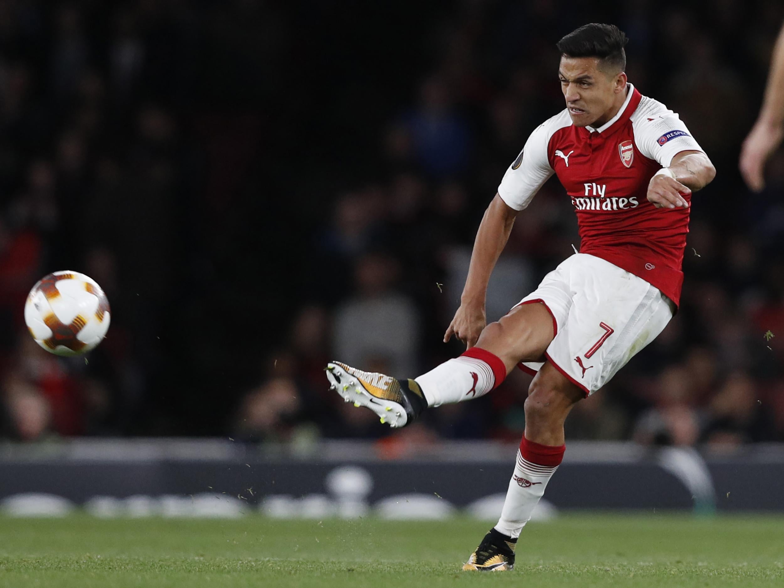 Alexis Sanchez puts Arsenal ahead with a delightful, curled strike from the edge of the box