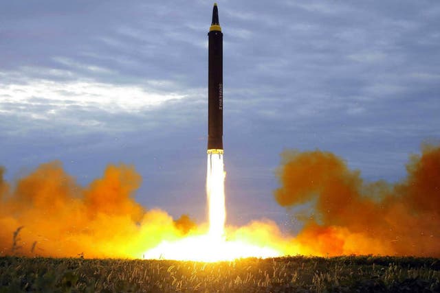 The test launch of a Hwasong-12 intermediate range missile from Pyongyang in August - which also flew over Japan