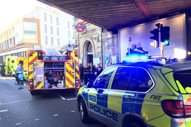 Handout photo issued by Richard Aylmer-Hall of emergency services attending an incident at Parsons Green station in west London amid reports of an explosion