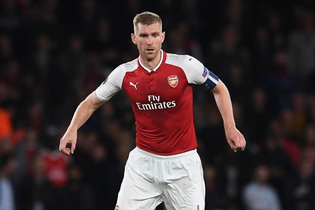 Per Mertesacker was a fan of the atmosphere inside the Emirates on Thursday night