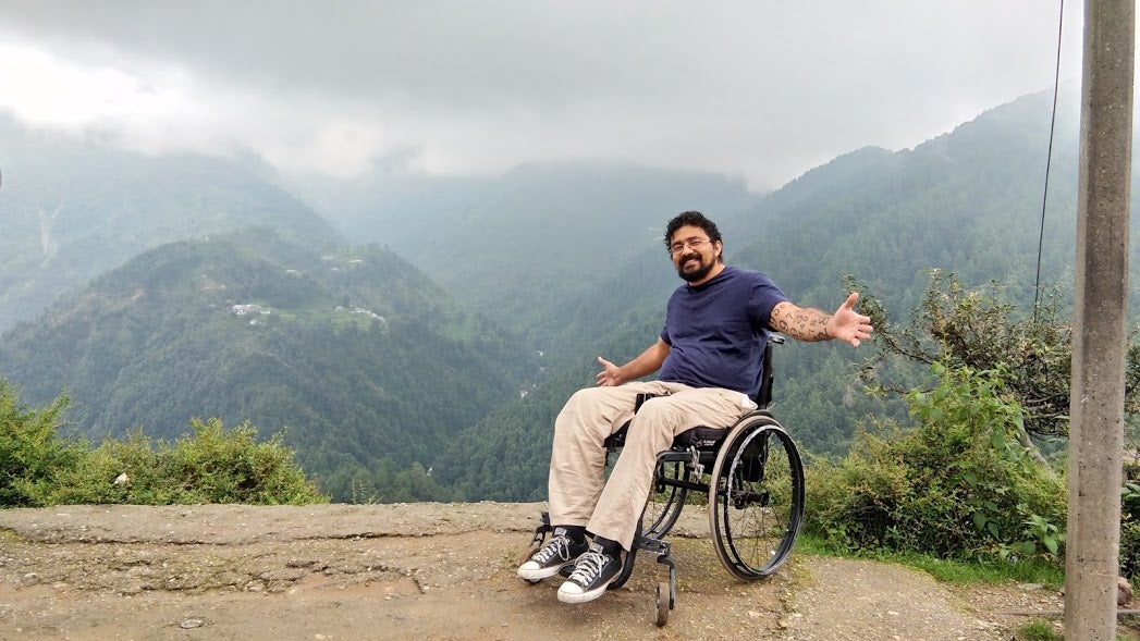 A traveller from Brazil at the edge of the cliff in Himachal