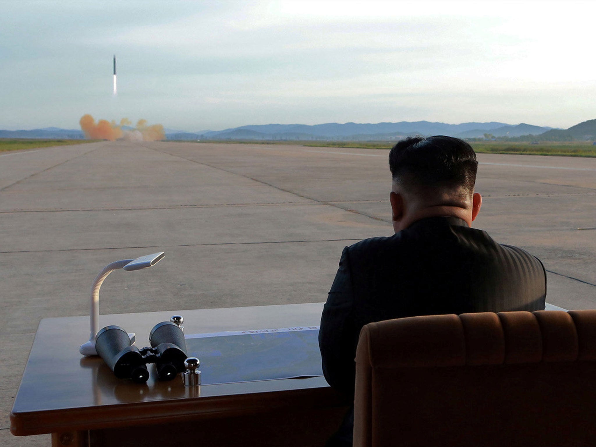 Kim Jong-un observes a missile launch