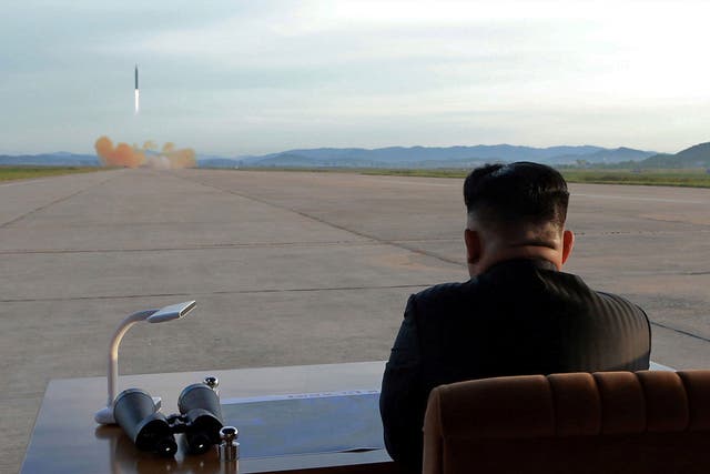 Kim Jong-un observes a missile launch
