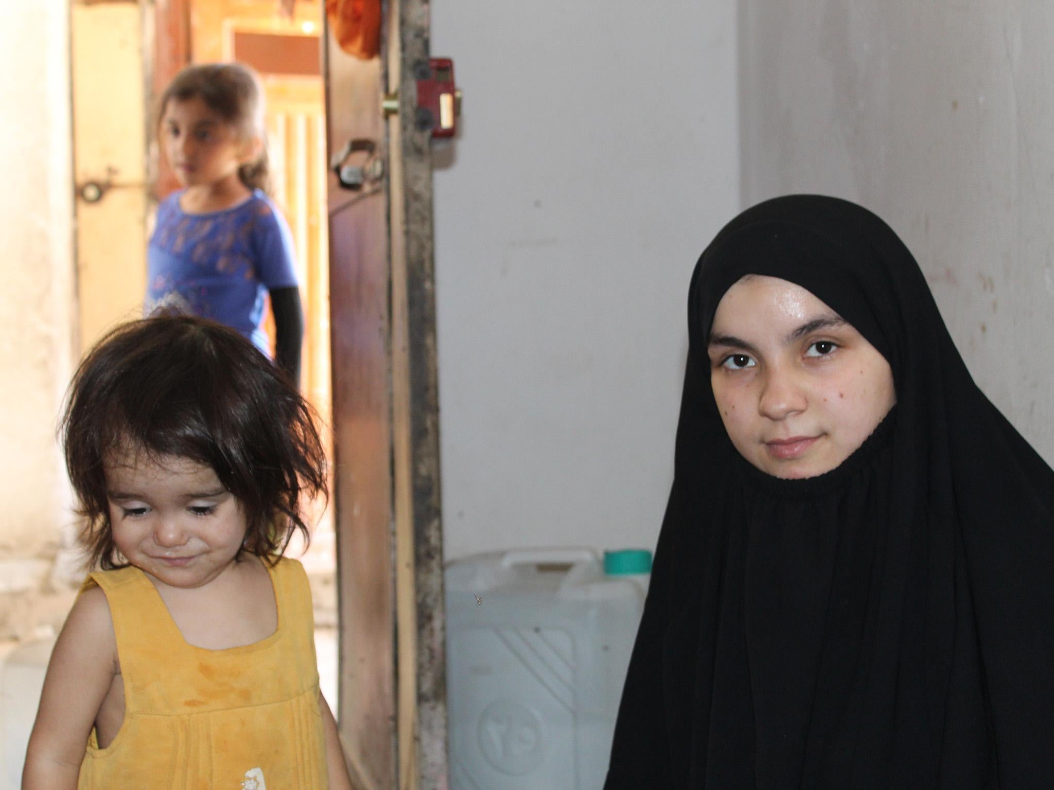 
Nour was 17 when she arrived in Syria. She has been widowed twice since (Bethan McKernan ) 
