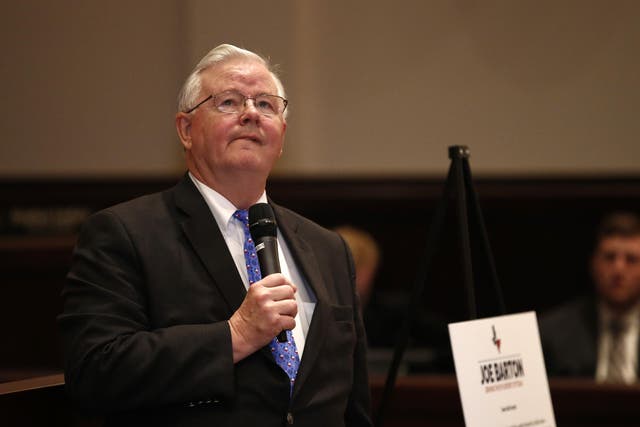 Representative Joe Barton answers a question during a town hall meeting at Mansfield City Hall