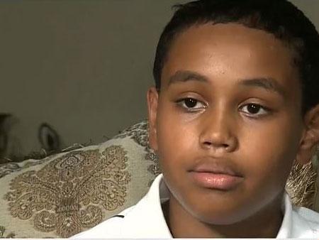 Stone Chaney, 11, said he was forcibly lifted from his chair by a teacher to stand for the Pledge of Allegiance