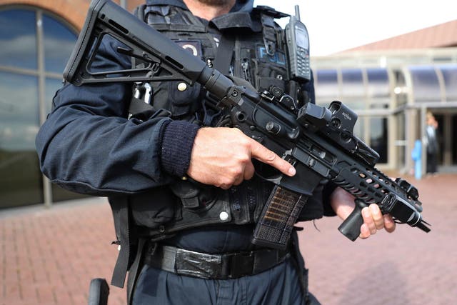Armed police patrolled the streets of a number of British cities