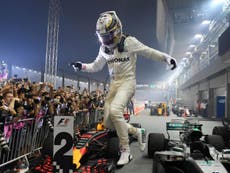 Hamilton extends lead after victory in rain-soaked Singapore GP