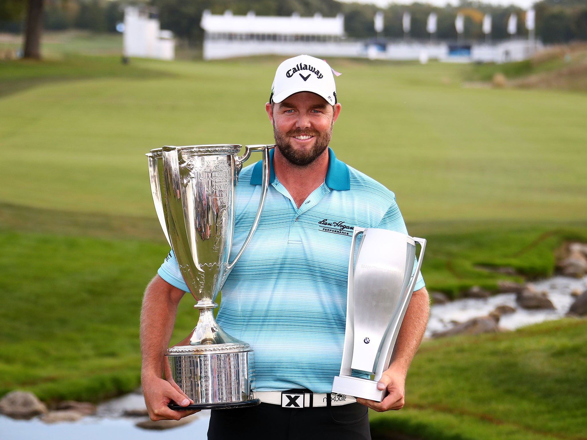 Marc Leishman celebrates winning the BMW Championship at the Conway Farms Golf Club