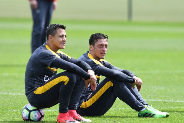 The two players in training together at Arsenal