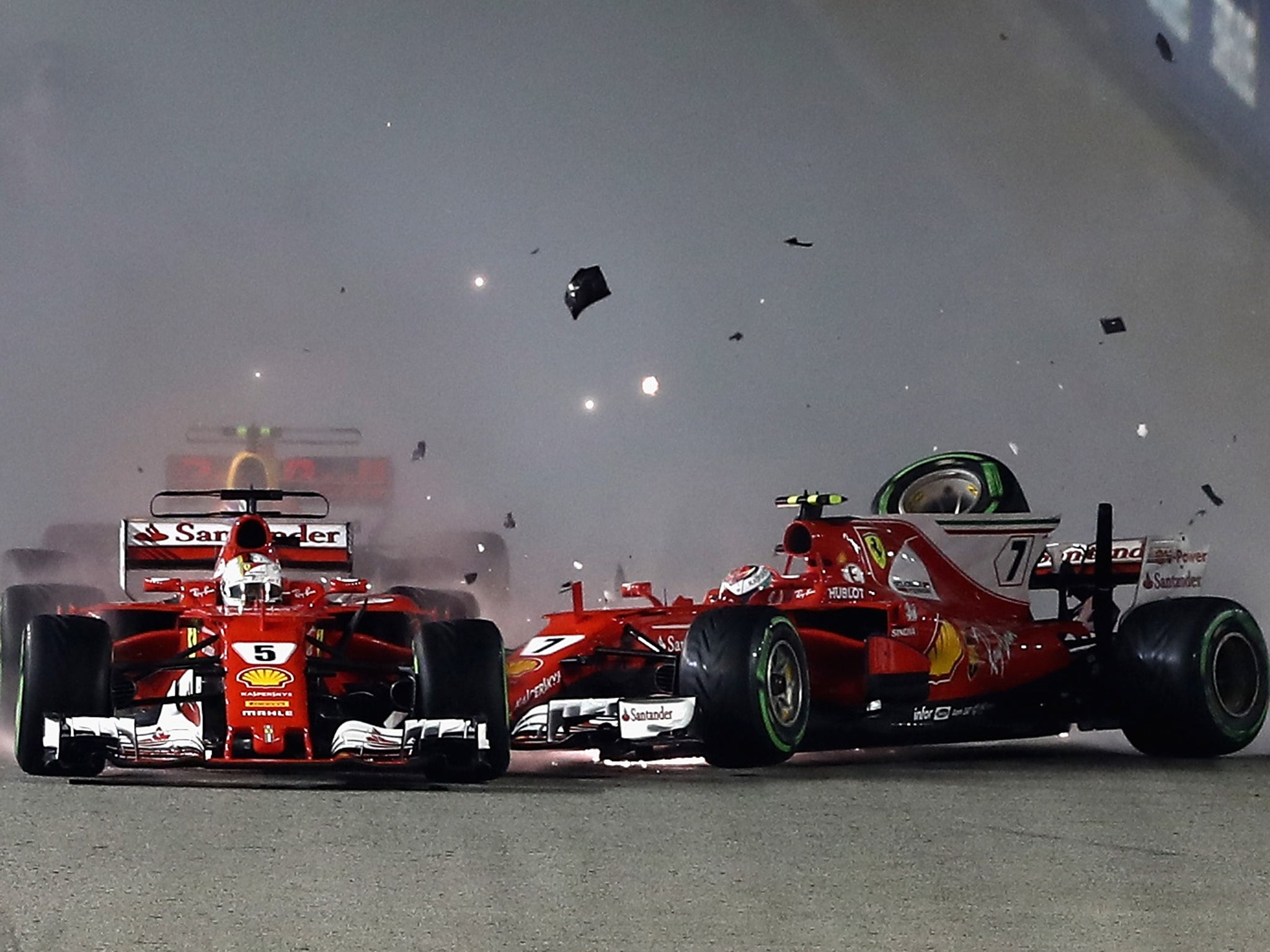 Vettel was involved in a first corner accident with Ferrari teammate Kimi Raikkonen and Red Bull's Max Verstappen