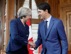 Brexit boost for May as Trudeau promises 'seamless' trade deal