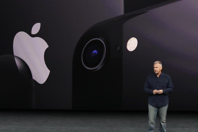 Apple Senior Vice President of Worldwide Marketing, Phil Schiller, introduces the iPhone 8 during a launch event in Cupertino, California, U.S. September 12, 2017
