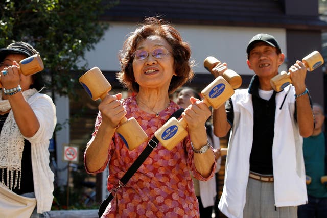 Elderly people exercise on Japan's Respect for the Aged Day in Tokyo