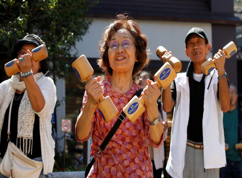Elderly people exercise on Japan's Respect for the Aged Day in Tokyo