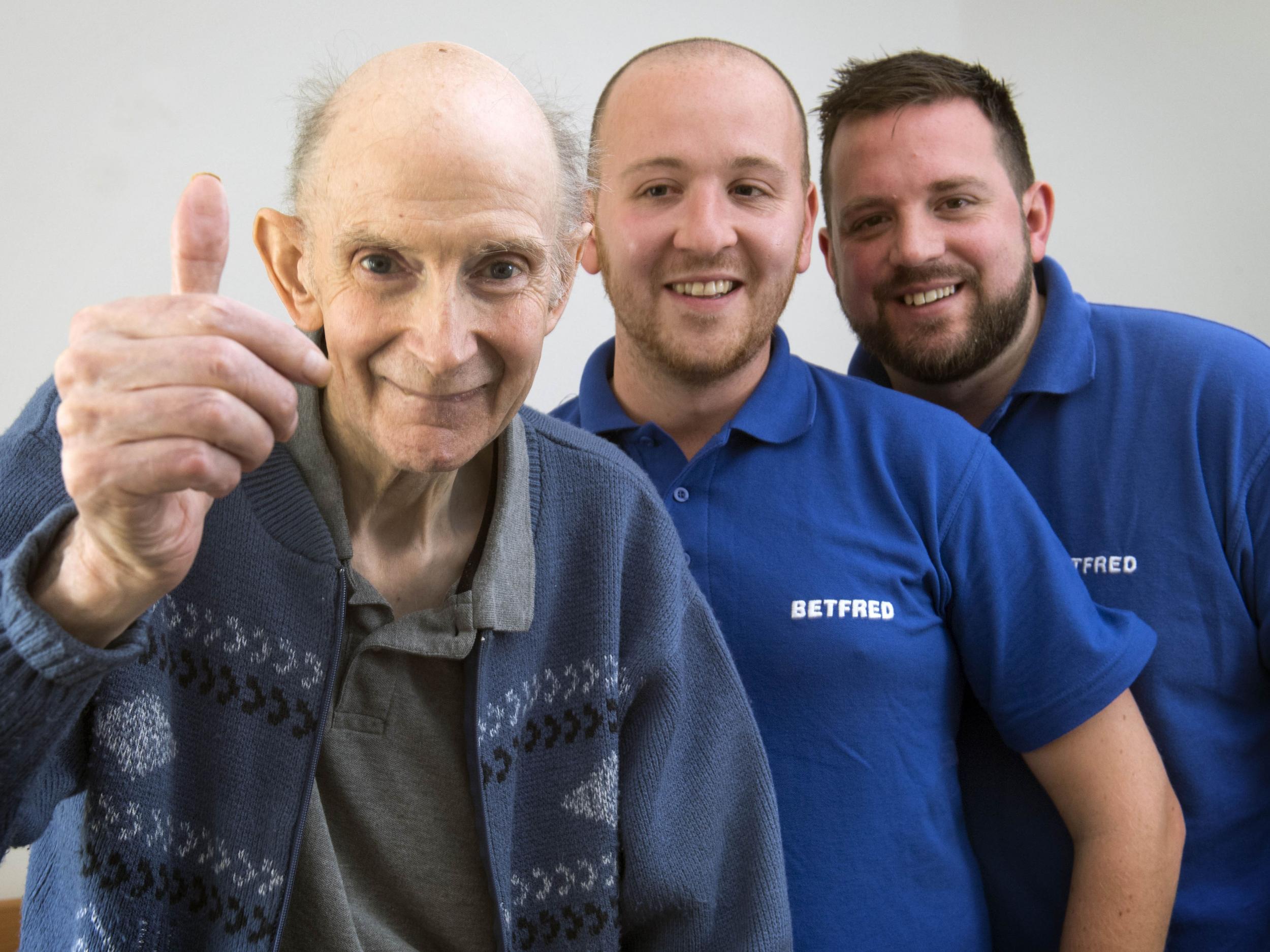 Michael Base (left), 72, and Betfred Staff Jack Bell (centre) and Jamie Scales