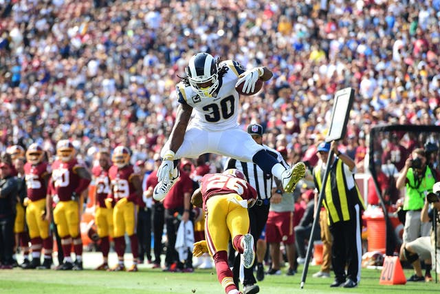 Todd Gurley hurdles a Redskins defender - and the Rams are Ed's Super Bowl pick