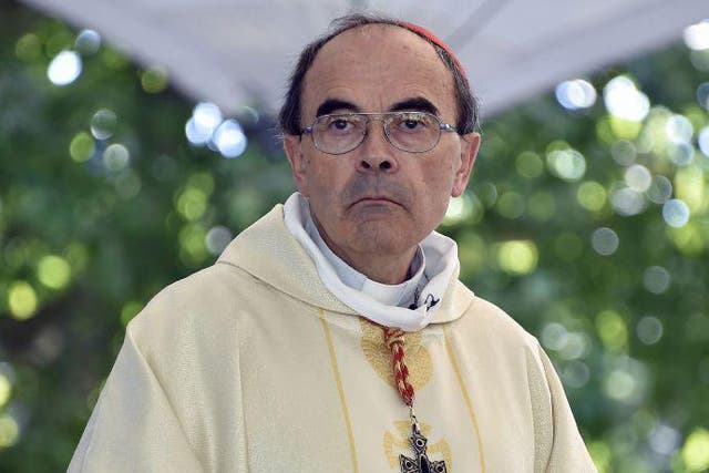 File photo of Roman Catholic Cardinal and archbishop of Lyon Philippe Barbarin celebrating a mass for the feast of the Assumption in the sanctuary of Our Lady in the French Southwestern pilgrimage city of Lourdes.