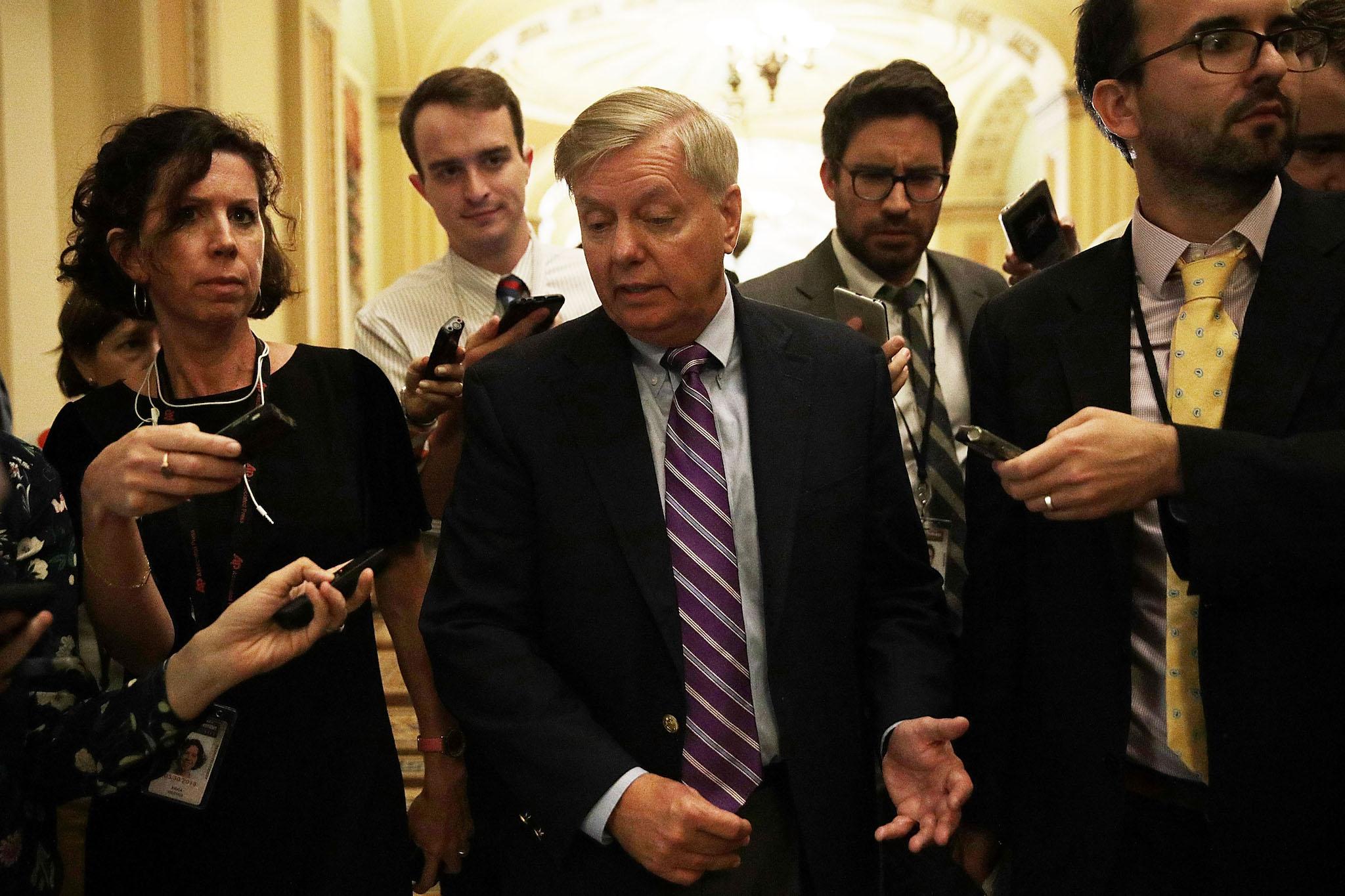 Senator Lindsey Graham speaks to reporters after the weekly Senate Republican policy luncheon at the Capitol