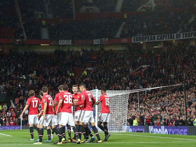United's players celebrate their second