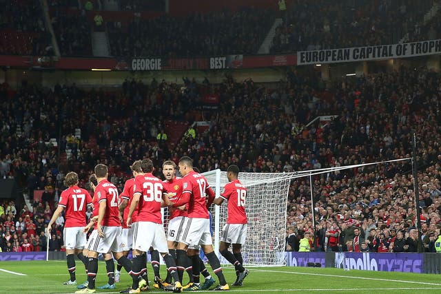 United's players celebrate their second