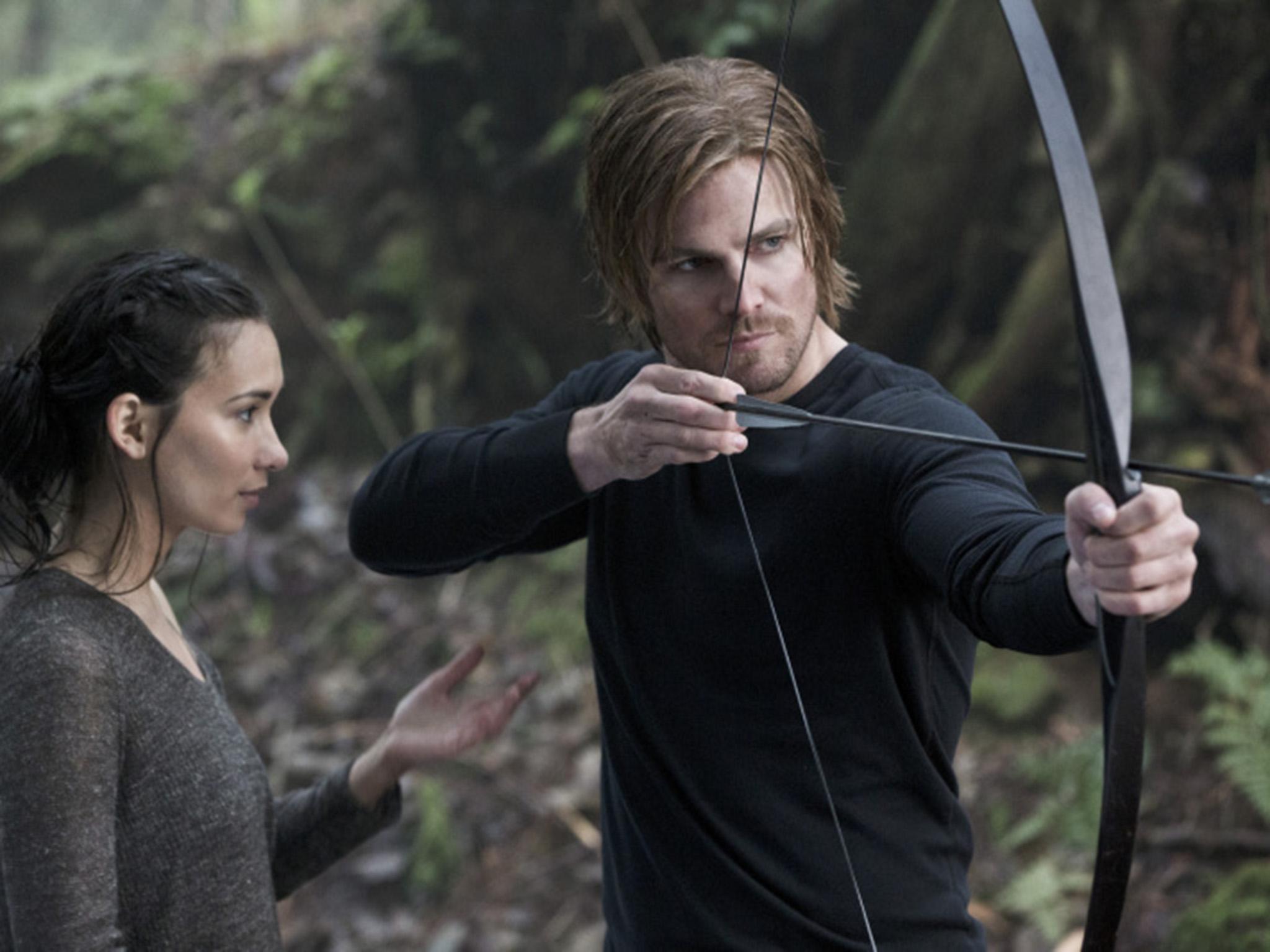 Jade as Shado and Stephen Amell as Oliver Queen in the US TV series 'Arrow'