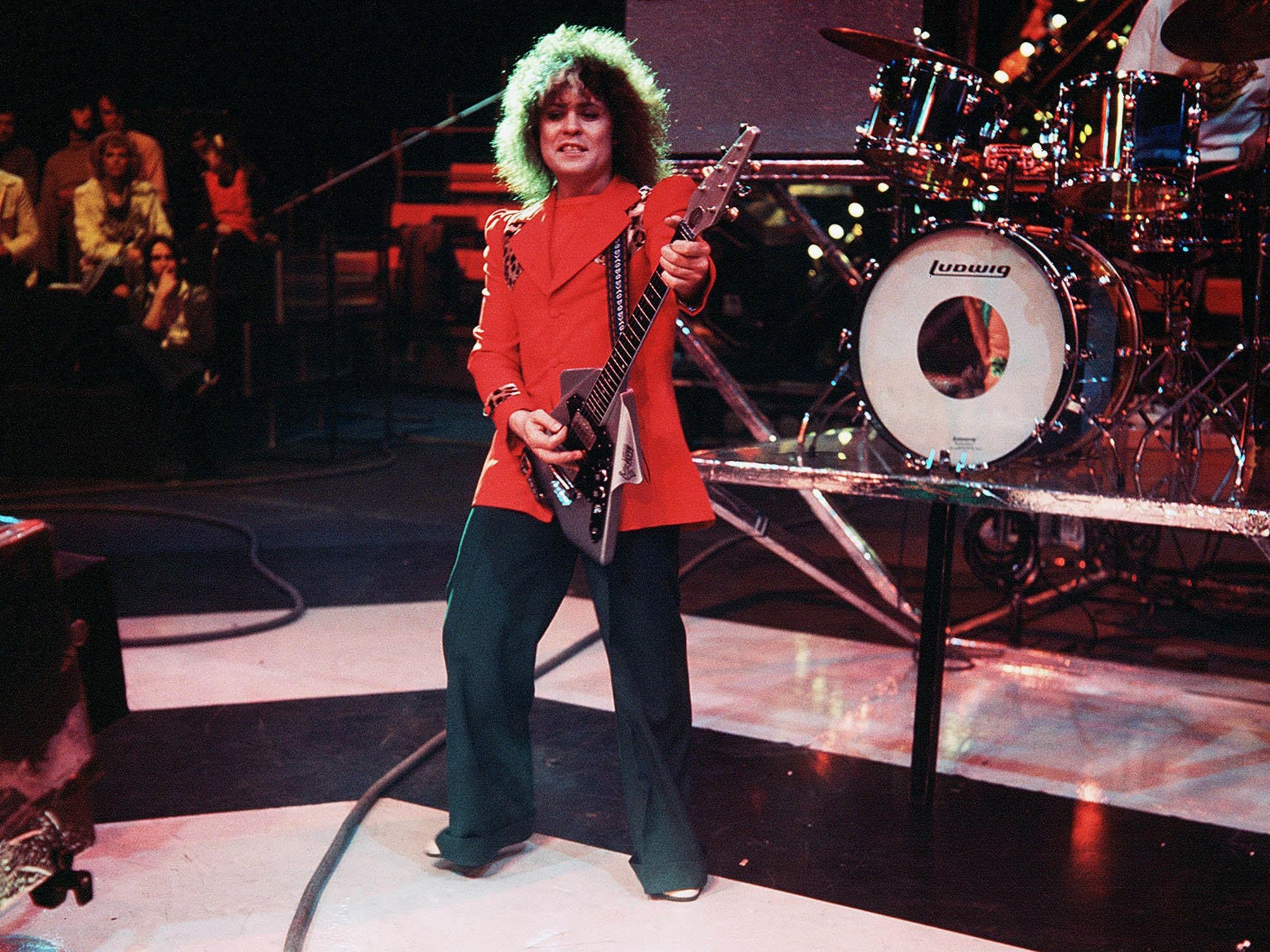 Red jacket and flares and with T. Rex in 1973