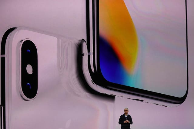 Apple CEO Tim Cook speaks during an Apple special event at the Steve Jobs Theatre on the Apple Park campus on September 12, 2017 in Cupertino, California