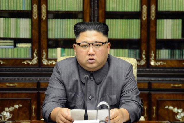 North Korean ruler Kim Jong Un reads out text in response Donald Trump's speech at the UN