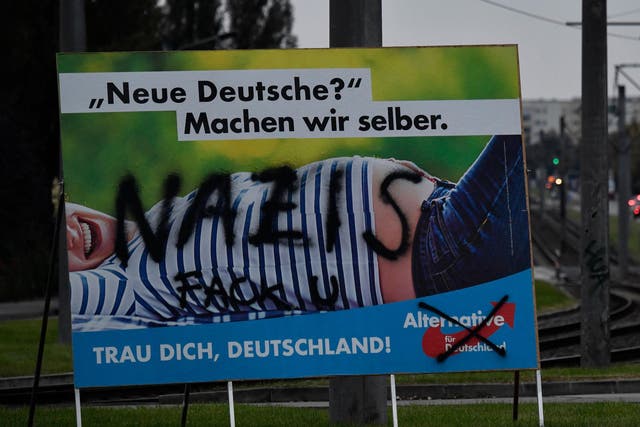 A vandalised Alternative für Deutschland campaign poster in Berlin