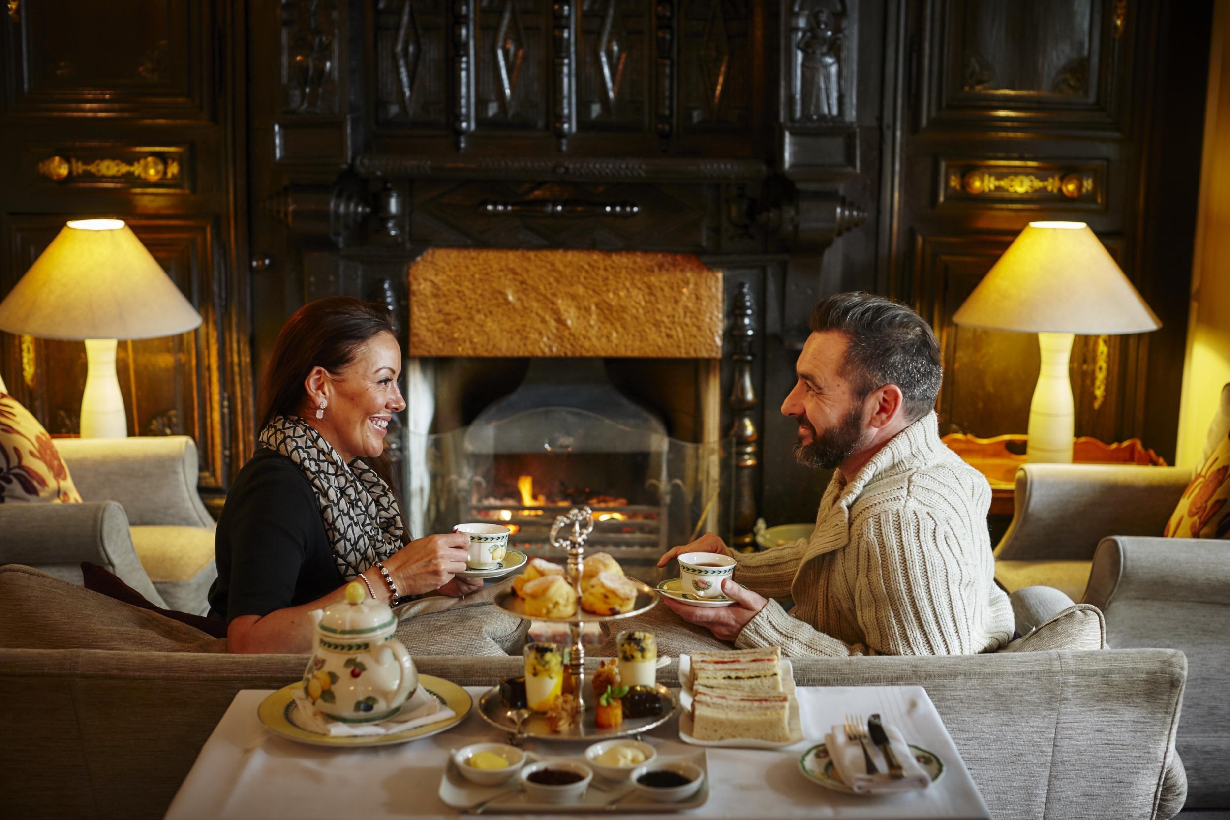 Unwind at the fireplace for a relaxing afternoon tea