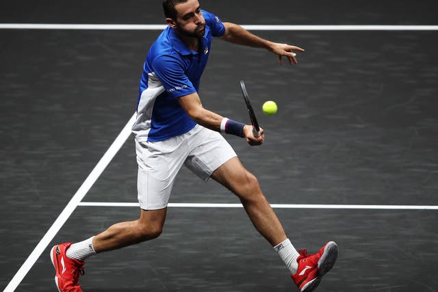 Marin Cilic in action against Frances Tiafoe