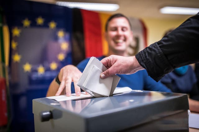 Voters turn out in Berlin to cast their ballots at a polling station during German federal elections