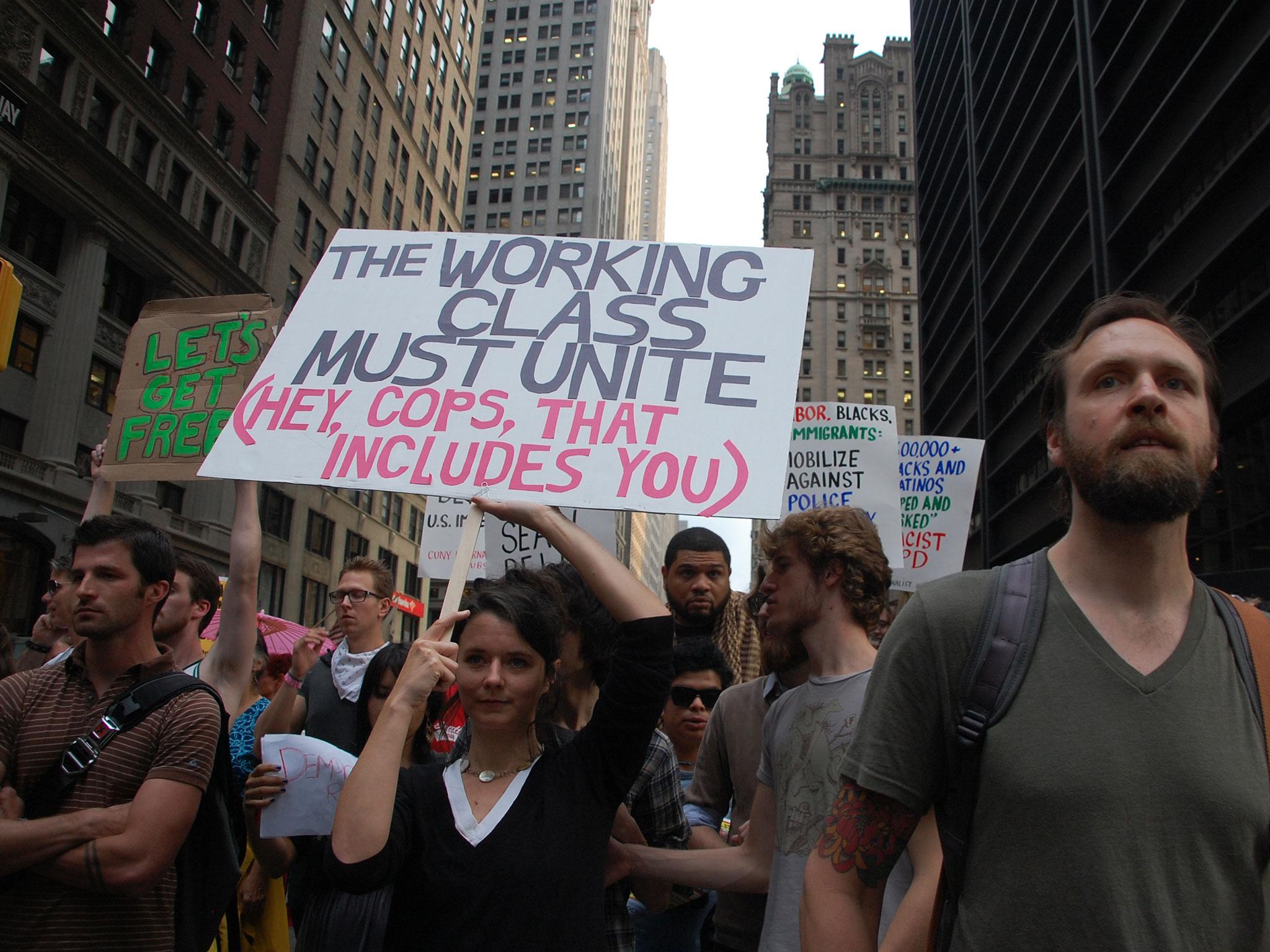 An image from Occupy Wall Street, a protest that influenced the song 'People Against People Against Progress'