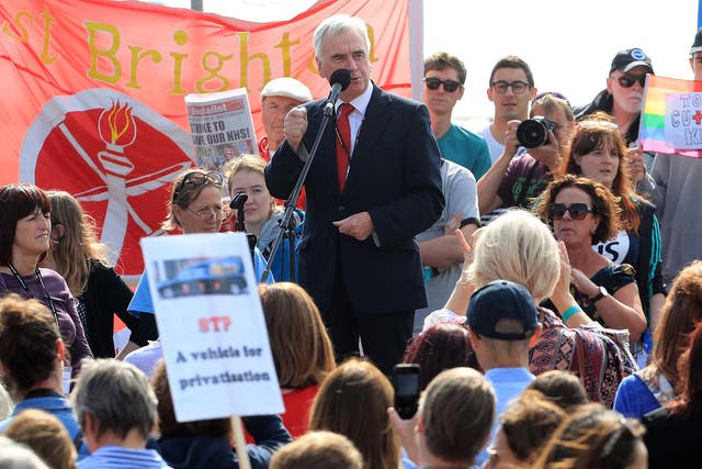 John McDonnell speaks to Labour supporters ahead of his conference speech in Brighton
